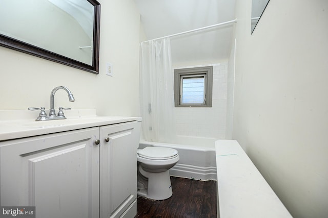 bathroom featuring shower / tub combo, toilet, wood finished floors, and vanity