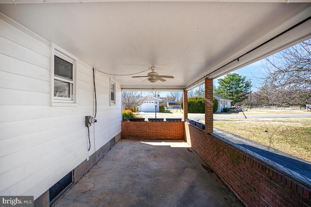 view of patio featuring covered porch and ceiling fan