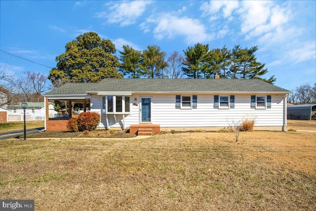 single story home with roof with shingles, a front lawn, and fence