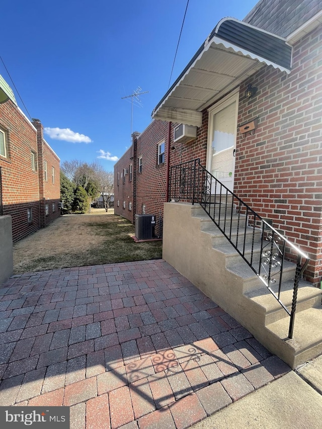 view of patio / terrace with central AC unit