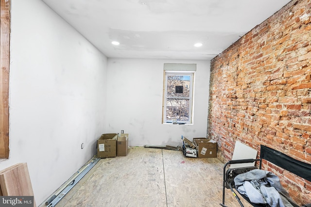 interior space with brick wall