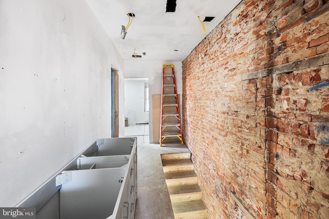 interior space with brick wall