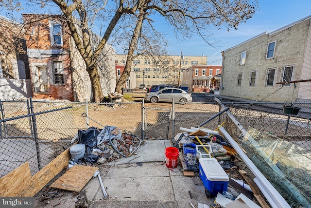 view of yard featuring a gate and fence