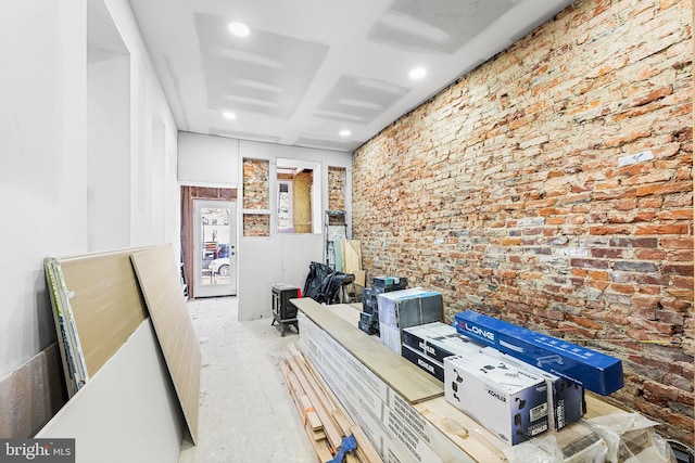 interior space with brick wall