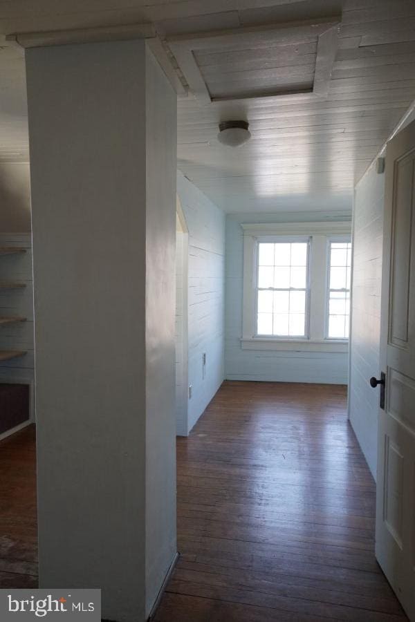 empty room featuring wood finished floors