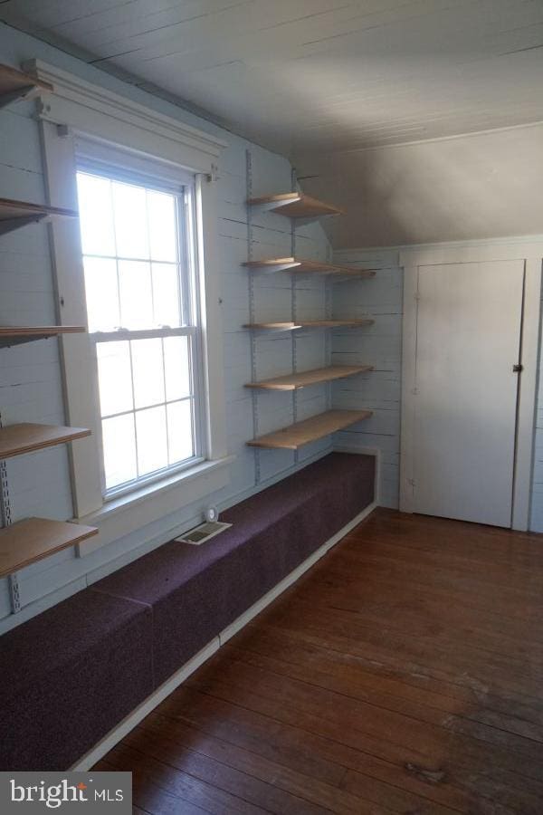 interior space with visible vents and hardwood / wood-style floors