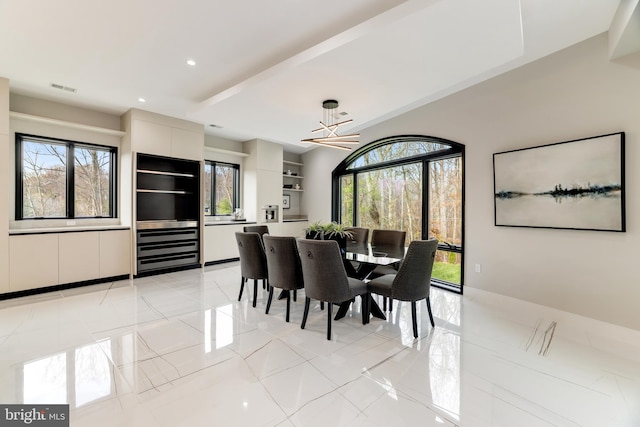 dining area with recessed lighting, visible vents, and beam ceiling