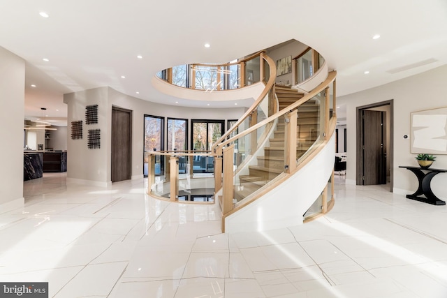 stairs featuring recessed lighting and baseboards