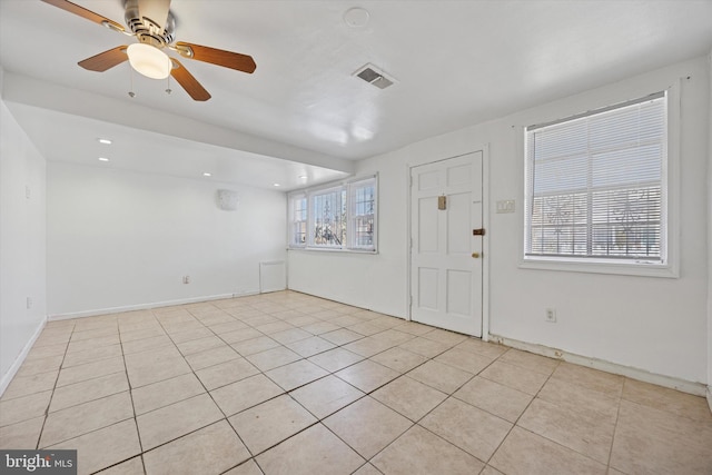 foyer featuring recessed lighting, light tile patterned flooring, a ceiling fan, and visible vents