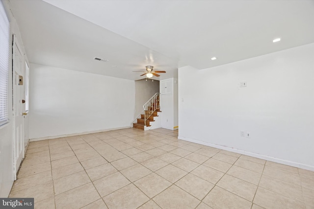 unfurnished room with visible vents, recessed lighting, stairway, baseboards, and ceiling fan