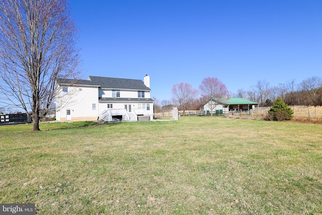 view of yard with fence