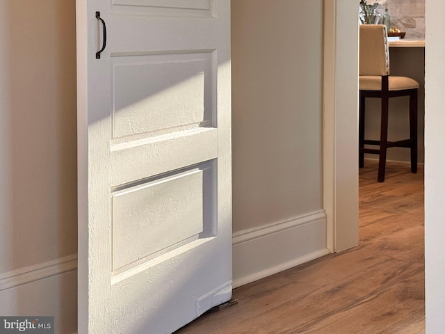 interior details featuring wood finished floors