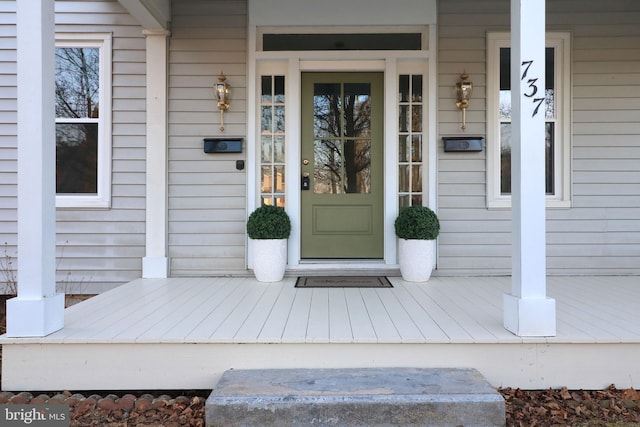 entrance to property with a porch