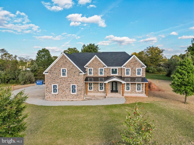 view of front of home with a front lawn