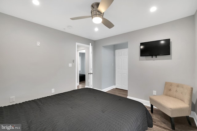 unfurnished bedroom featuring recessed lighting, ceiling fan, baseboards, and wood finished floors