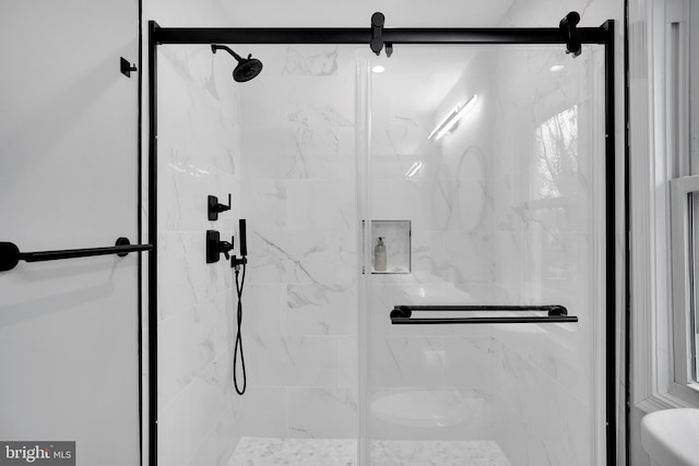 full bathroom with a shower stall