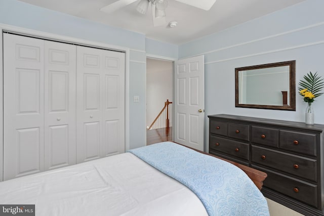 bedroom with a closet and a ceiling fan