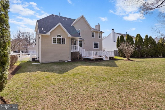 rear view of property with fence, a lawn, cooling unit, a deck, and crawl space