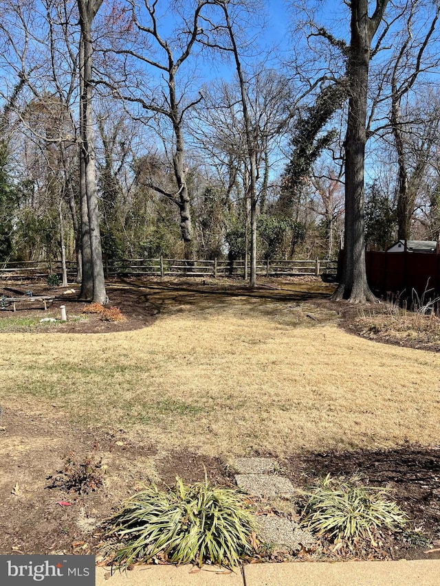 view of yard featuring fence