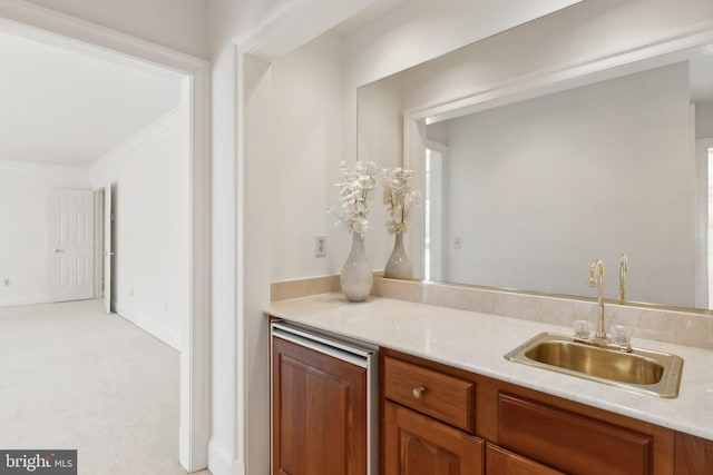 bar with crown molding and a sink