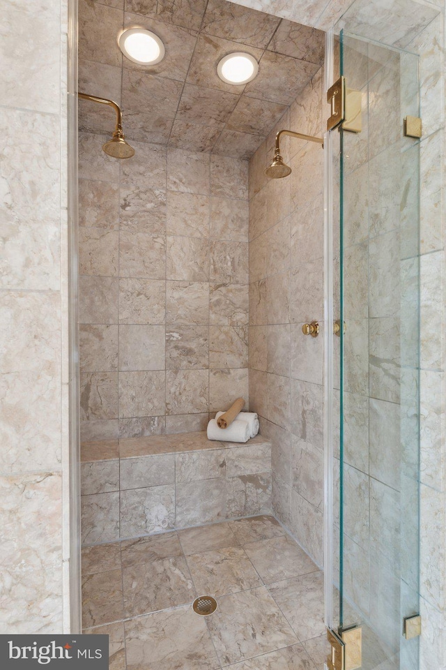 bathroom featuring a shower stall