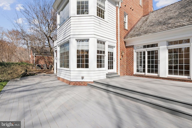 exterior space with entry steps and a patio