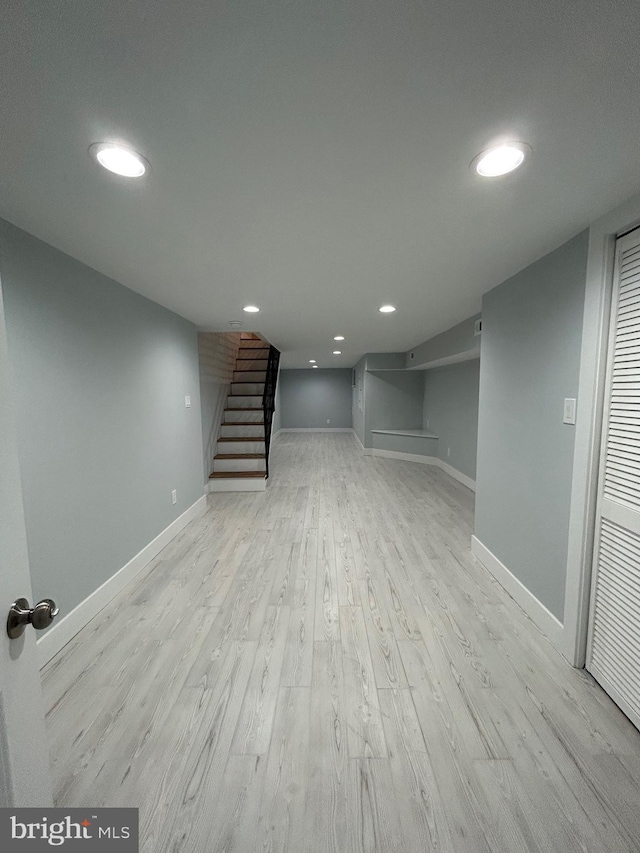 2869 Aramingo Ave, Philadelphia, PA 19134 - finished below grade area featuring stairs, recessed lighting, light wood-style floors, and baseboards