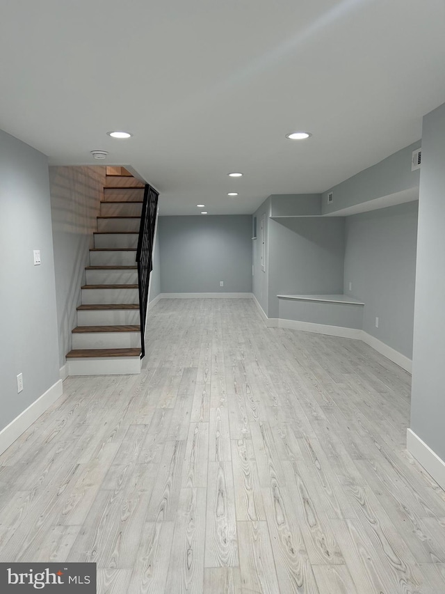 2869 Aramingo Ave, Philadelphia, PA 19134 - finished below grade area featuring recessed lighting, stairs, baseboards, and wood finished floors