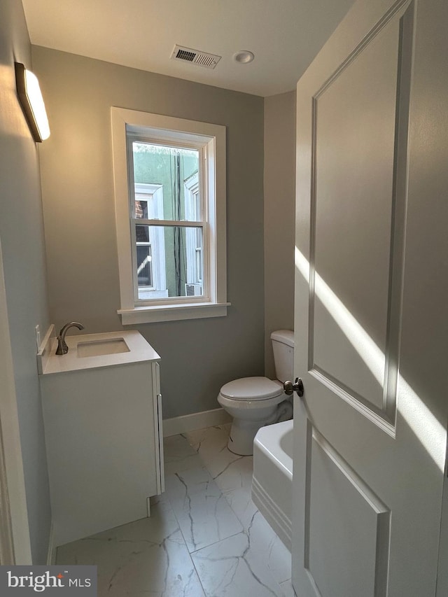 2869 Aramingo Ave, Philadelphia, PA 19134 - bathroom with visible vents, toilet, marble finish floor, baseboards, and vanity