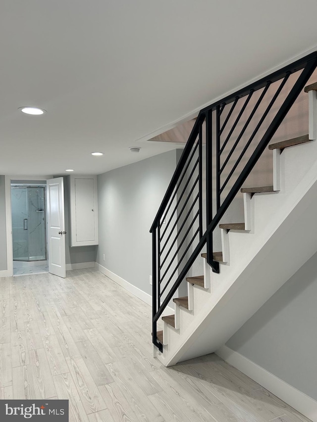 2869 Aramingo Ave, Philadelphia, PA 19134 - stairway featuring recessed lighting, baseboards, and wood finished floors