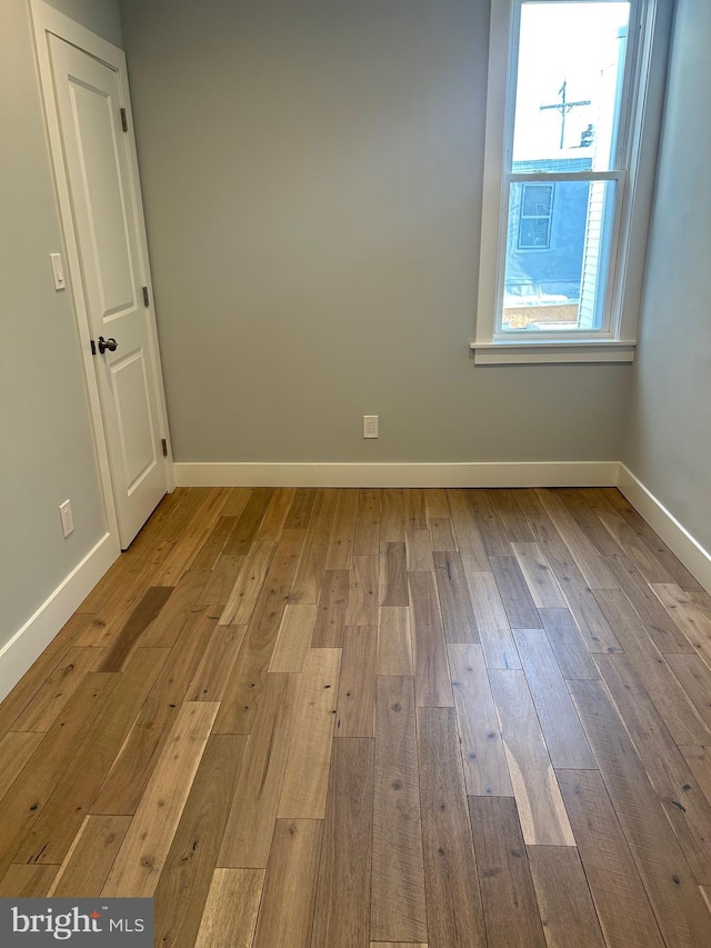 2869 Aramingo Ave, Philadelphia, PA 19134 - empty room featuring baseboards and hardwood / wood-style flooring