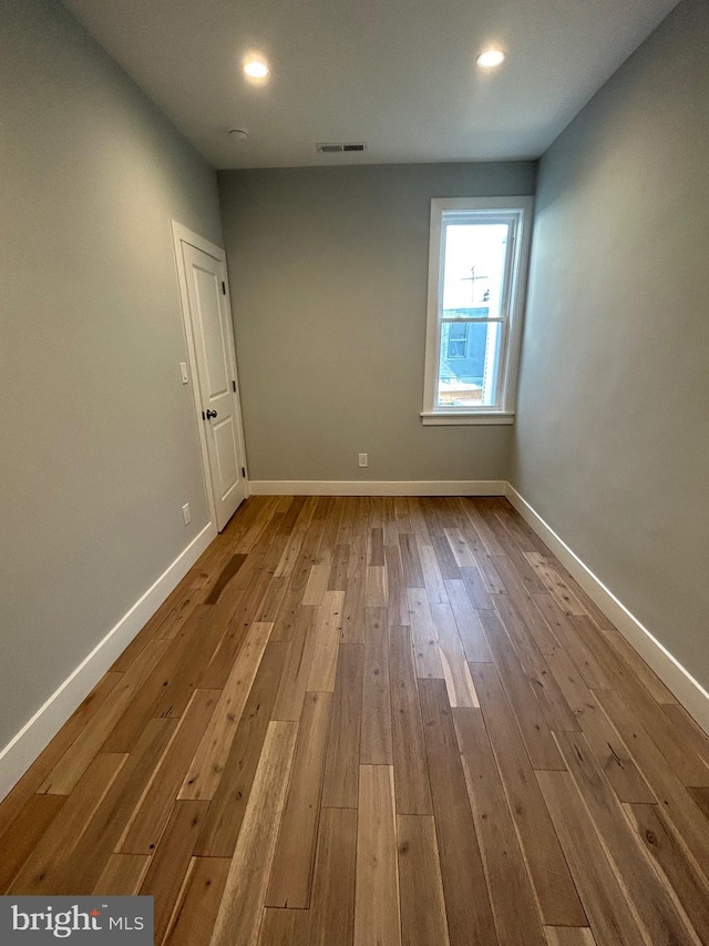 2869 Aramingo Ave, Philadelphia, PA 19134 - spare room featuring recessed lighting, visible vents, baseboards, and hardwood / wood-style flooring
