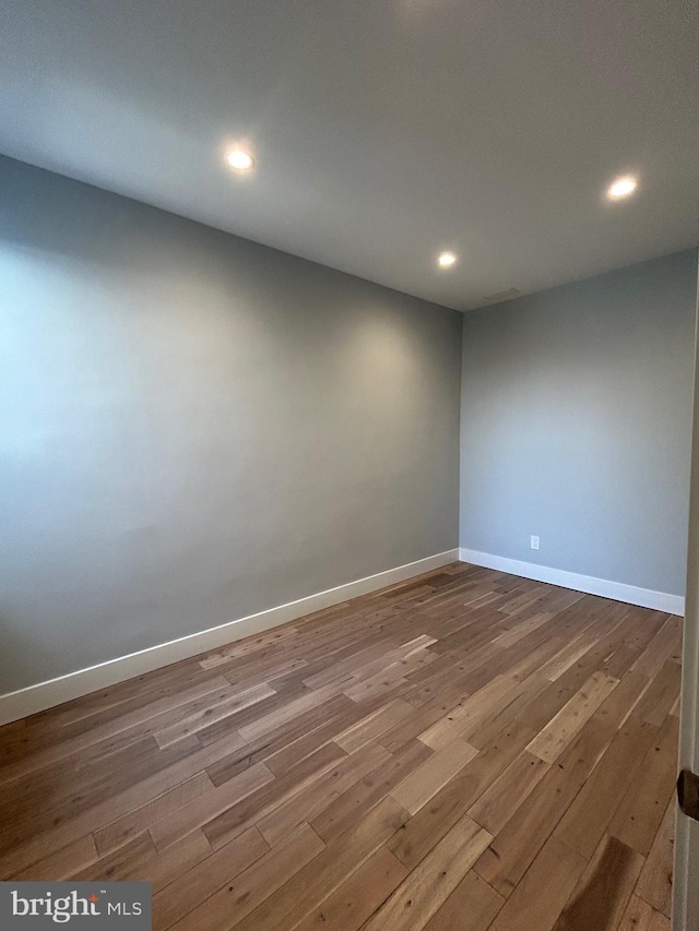 2869 Aramingo Ave, Philadelphia, PA 19134 - spare room featuring recessed lighting, baseboards, and wood finished floors
