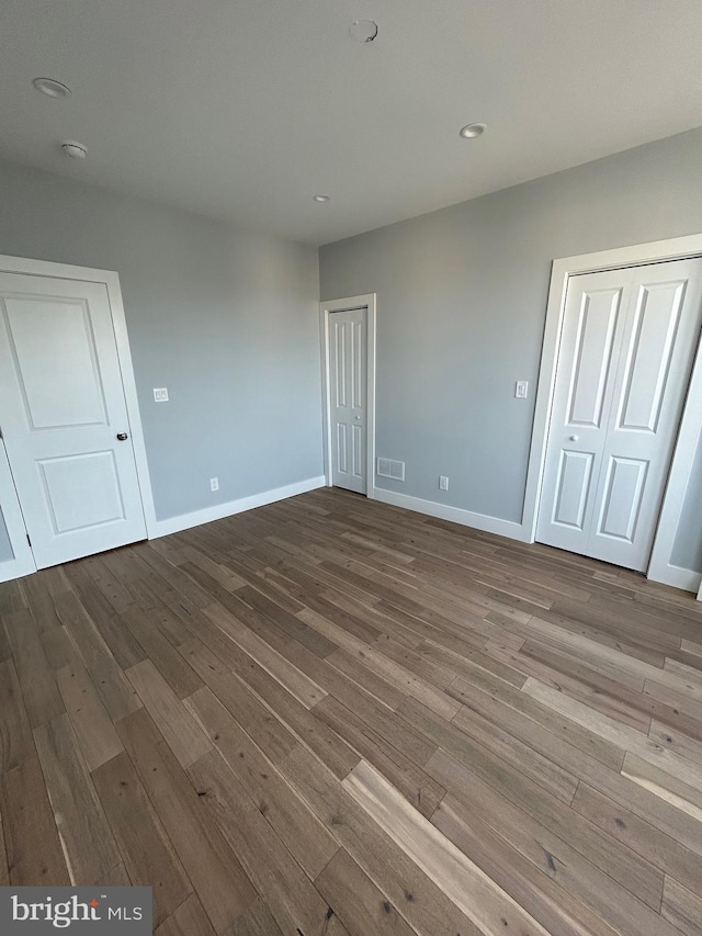 2869 Aramingo Ave, Philadelphia, PA 19134 - unfurnished room with recessed lighting, visible vents, baseboards, and dark wood-type flooring