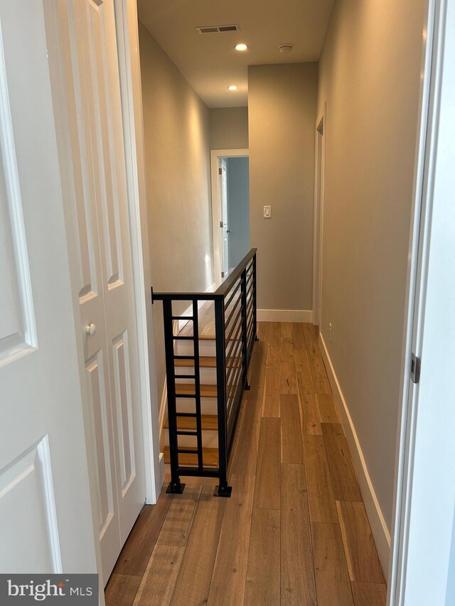 2869 Aramingo Ave, Philadelphia, PA 19134 - corridor featuring recessed lighting, visible vents, wood-type flooring, and baseboards