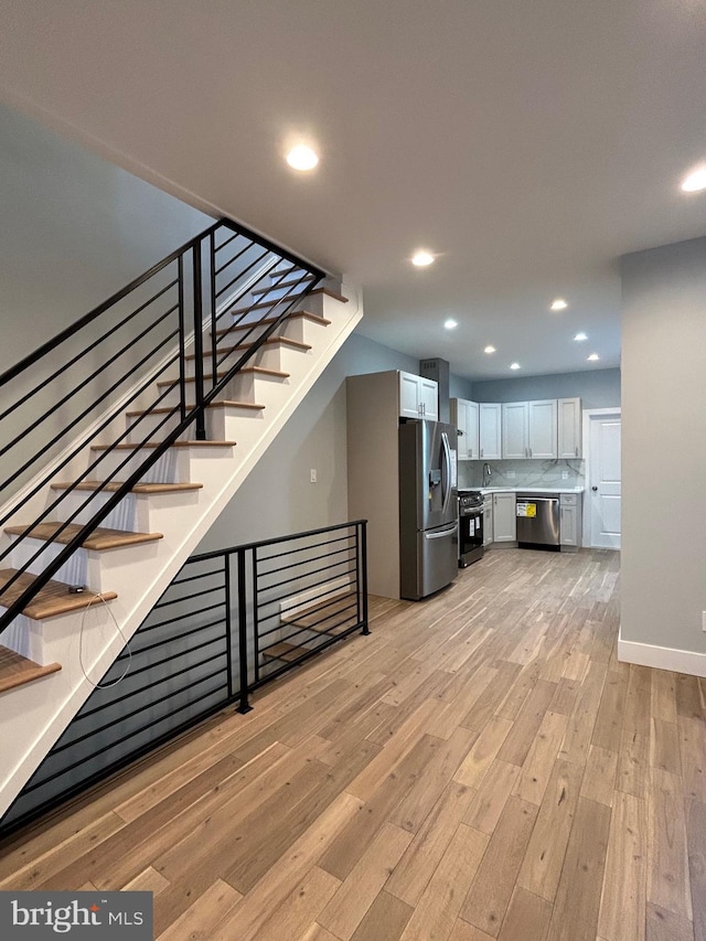 2869 Aramingo Ave, Philadelphia, PA 19134 - interior space featuring recessed lighting, wood finished floors, and baseboards
