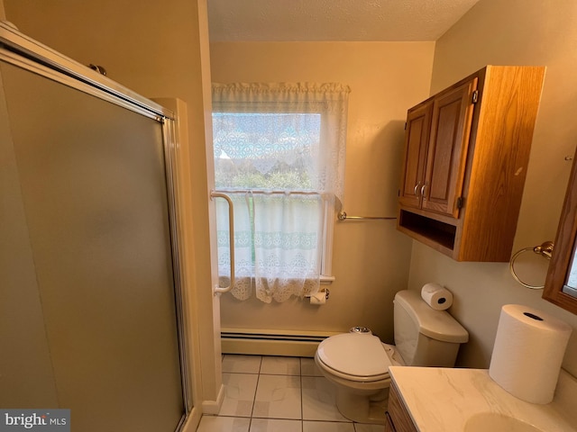 full bath with a shower stall, vanity, a baseboard radiator, and toilet