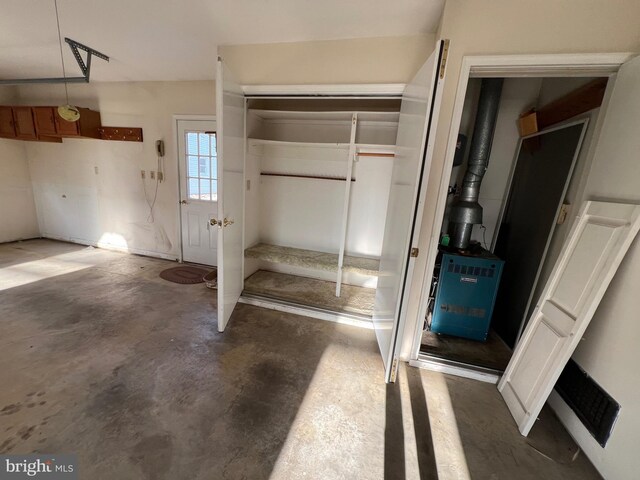 interior space featuring concrete flooring