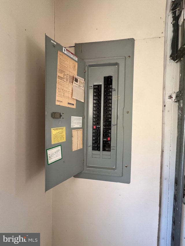 utility room featuring electric panel