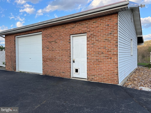 garage with driveway