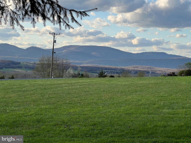 view of mountain feature with a rural view