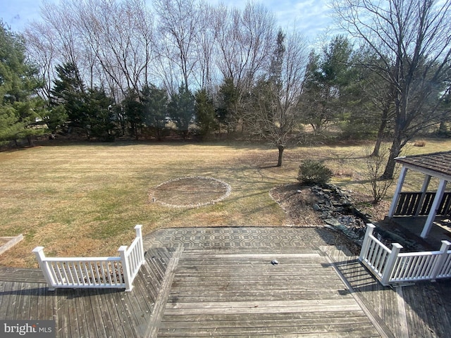 view of yard with a deck