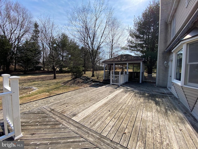 wooden terrace with a gazebo