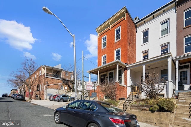 exterior space with brick siding