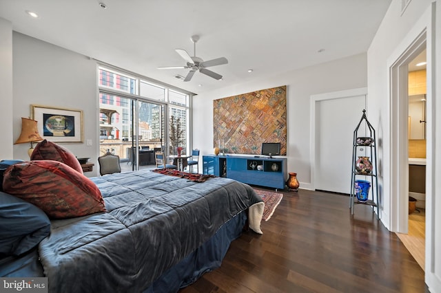 bedroom featuring recessed lighting, floor to ceiling windows, a ceiling fan, and wood finished floors