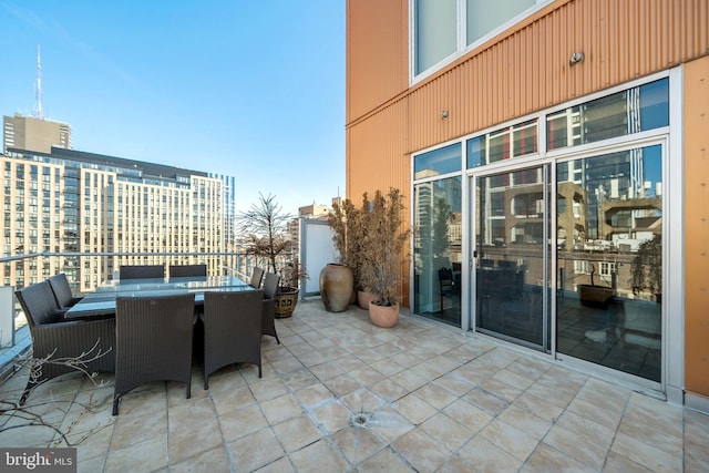 view of patio with outdoor dining area