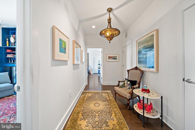 hall with recessed lighting, visible vents, baseboards, and dark wood-style flooring