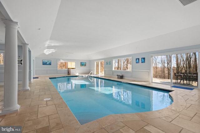 indoor pool with decorative columns