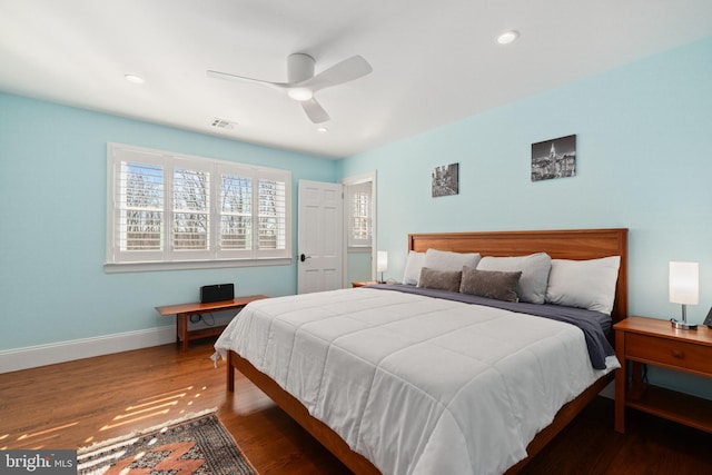 bedroom featuring visible vents, wood finished floors, recessed lighting, baseboards, and ceiling fan