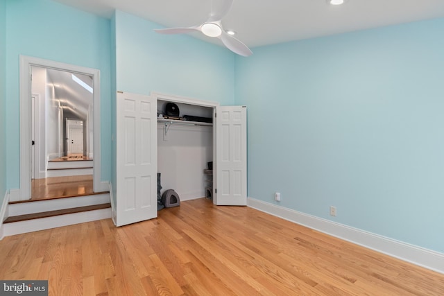 unfurnished bedroom featuring recessed lighting, baseboards, light wood-type flooring, and a closet